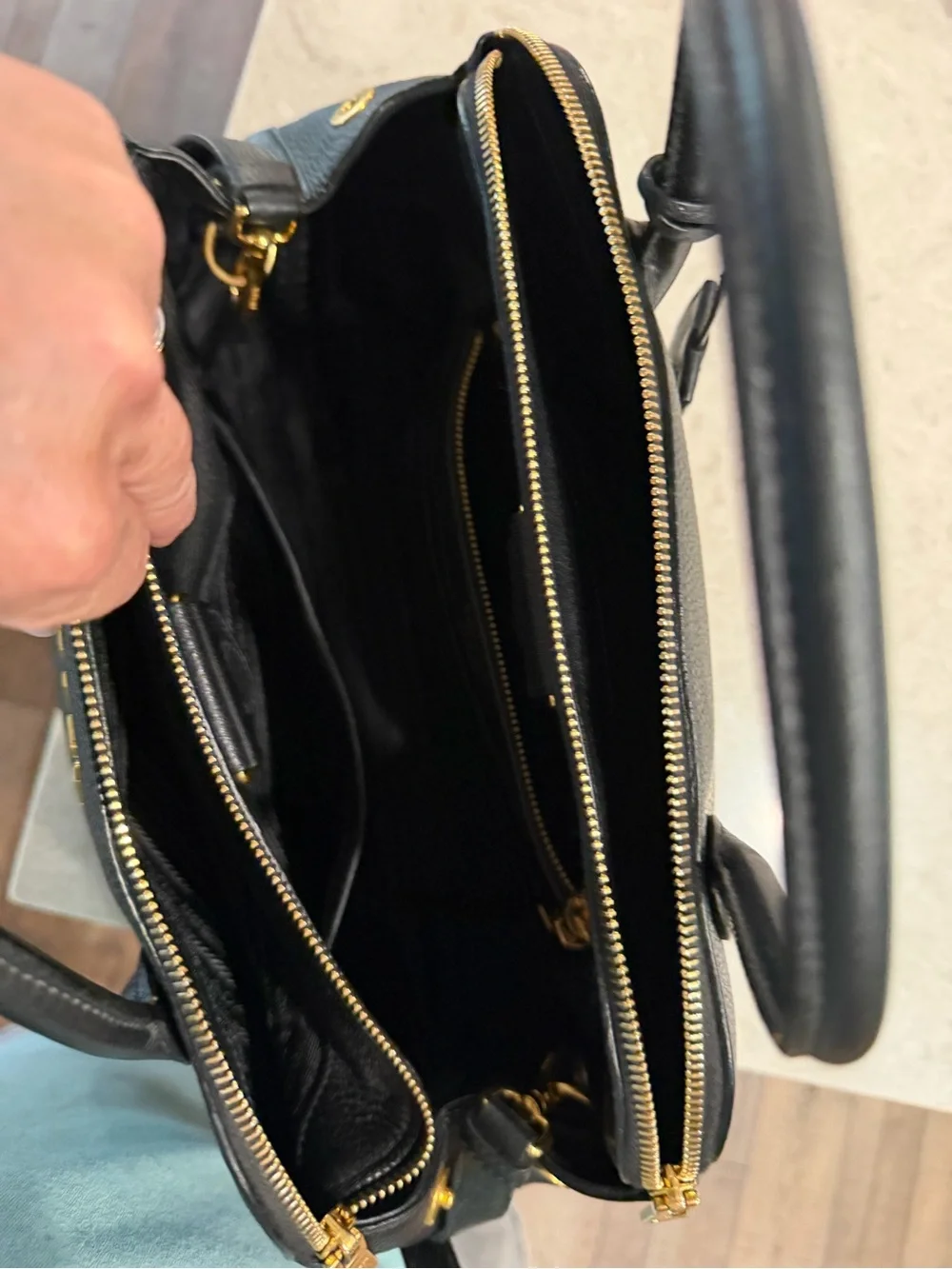 Prada Black Pebbled Leather Satchel with Gold Logo